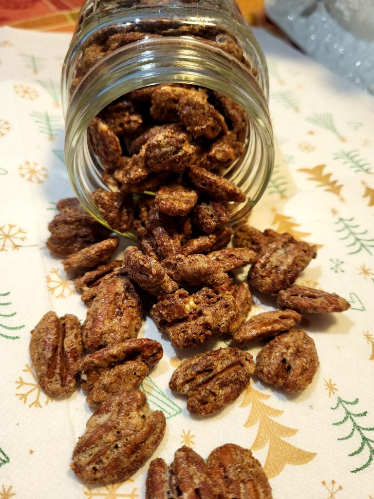 homemade pecans spilling out of jar