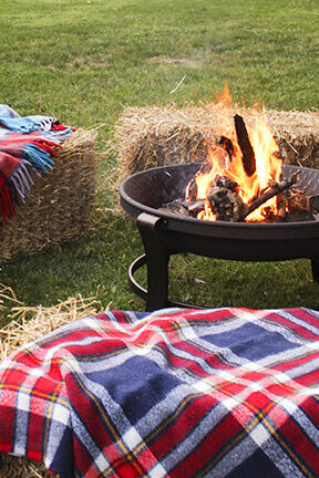 western outdoor decorating ideas. Picture of straw bales and camp fire