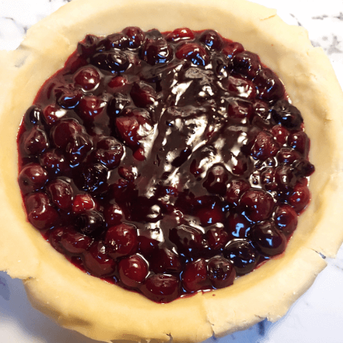 cherry pie filling in the pie shell