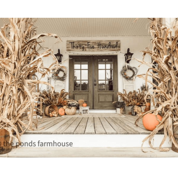 bundled corn on a porch DIY fall yard decor ideas