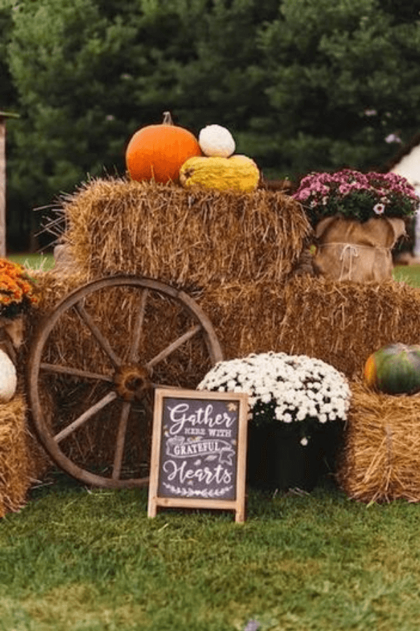 straw bales, mums and wagon wheel