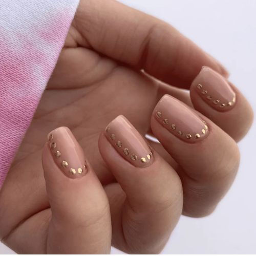 light pink nails with gold details