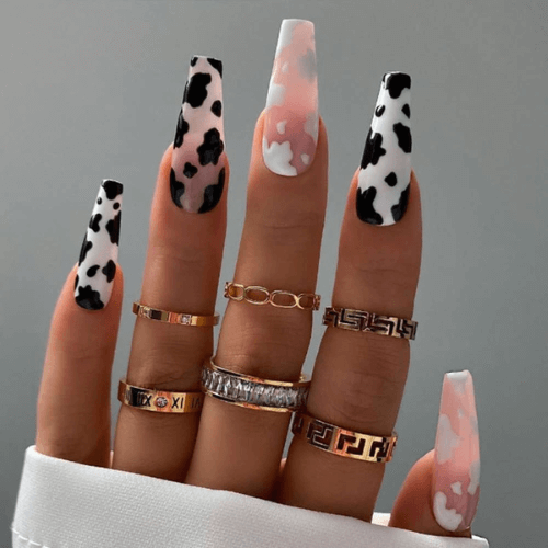 Cow print western nails black and white and pink