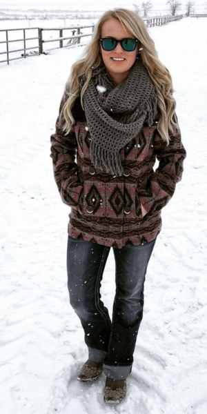 lady wearing a western jacket in the snow